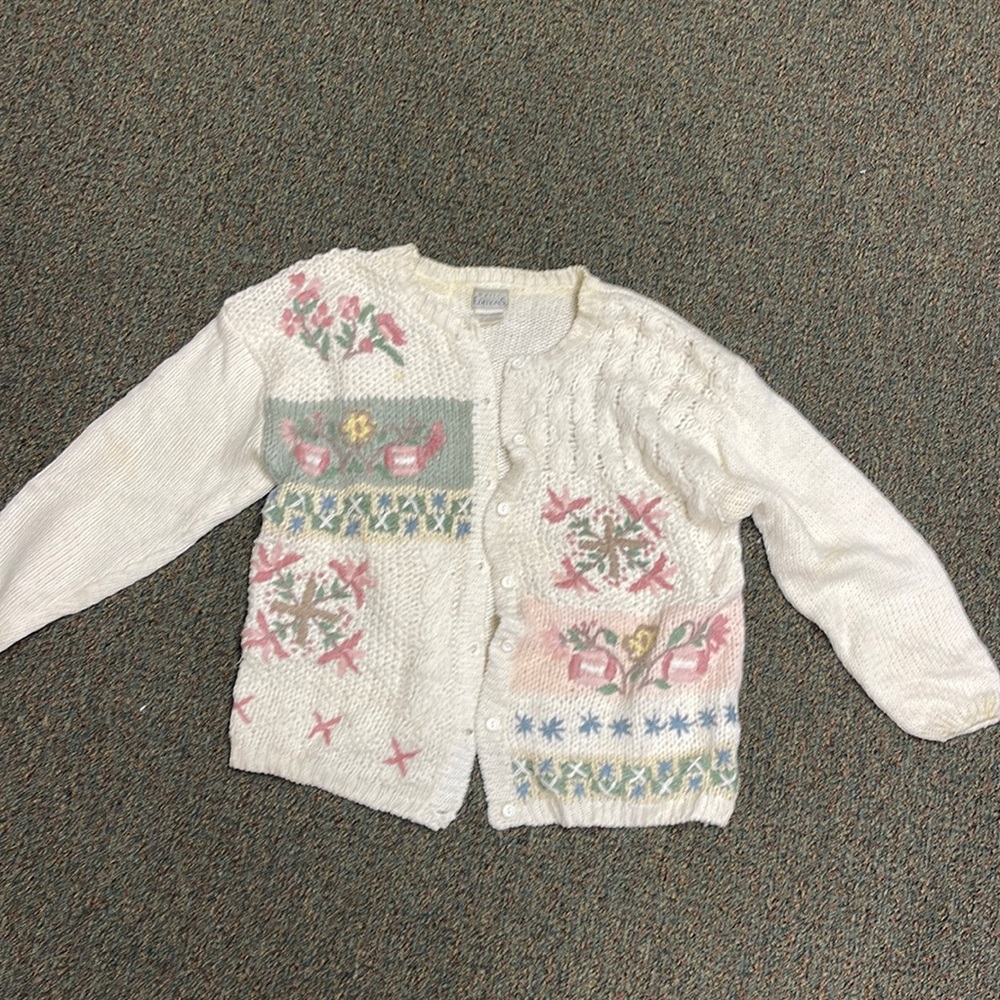 Woman’s cardigan sweater.  Size large.  Gently used